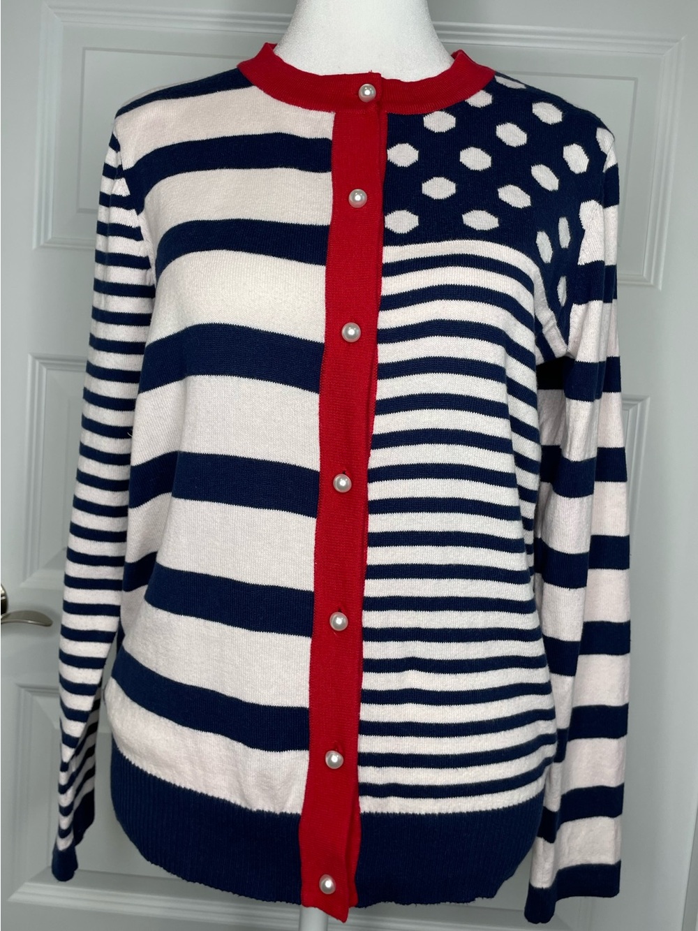 Serengeti Blue & White Striped Lightweight Cardigan with Red Trim.
Size Small.